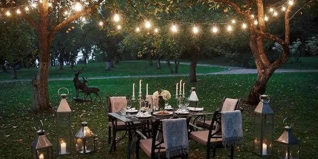 Outdoor dining area decorated for backyard entertaining